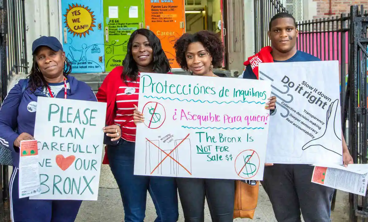 Rally participant holding a sign about a transparent process.